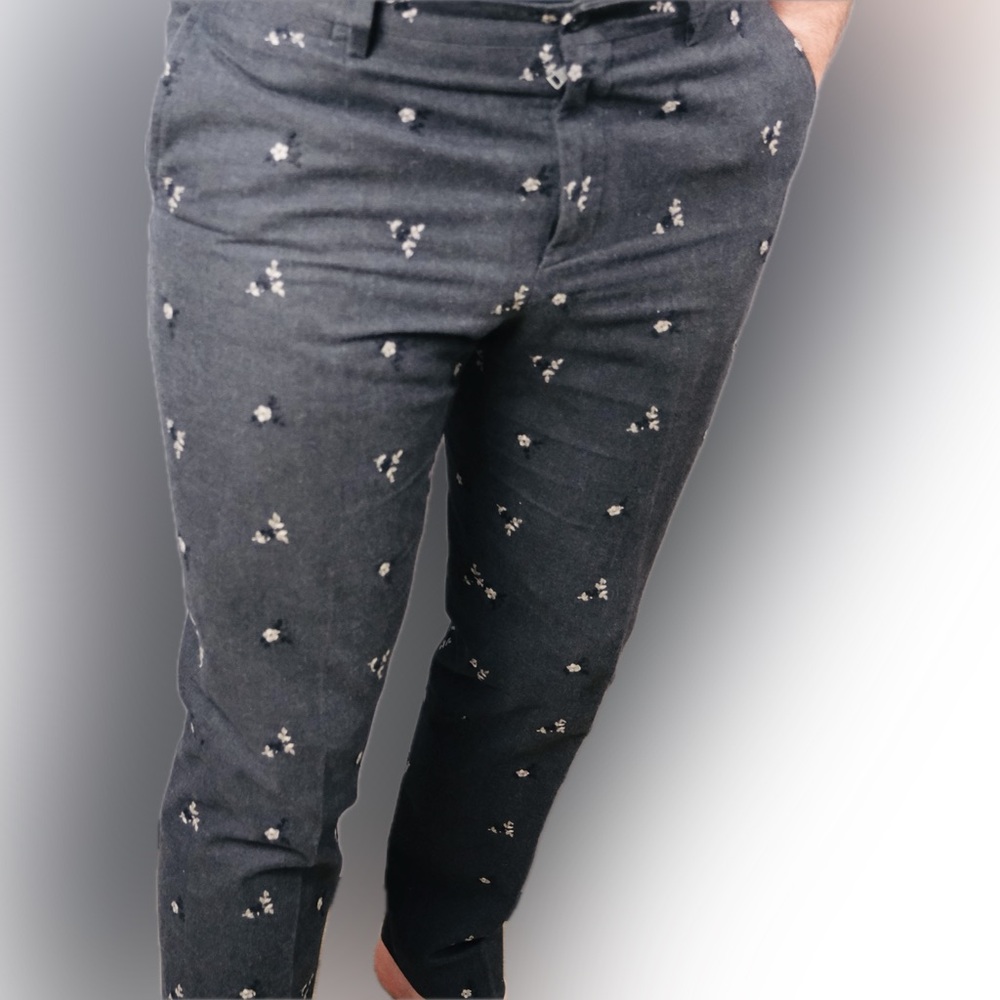 Dolce & Gabbana men’s formal trousers. Floral detail on grey.